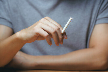 Quit, stop smoking, addiction asian man, man refusing cigarette, smoker quitting smoke, hand in broken, break tobacco. Quit bad habit,health care concept. Willpower lifestyle of people.