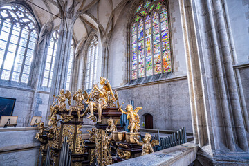St Barbara Cathedral Interior: Medieval Statue, Stained Glass Windows, and Gothic Vaulted Interior....