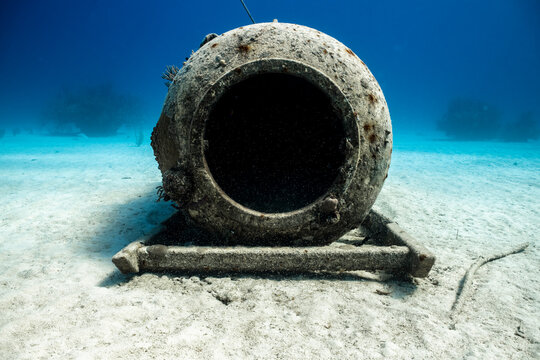 Wreck of hyperbaric chamber resting on ocean floor in Bahamas