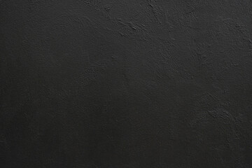 blank black painted wall for background.
