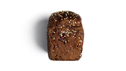 Black, rye bread with dried fruit on a white background. High quality photo