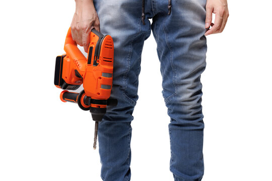 Construction worker with hand drill standing isolated on white background