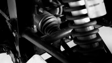 Old car suspensions. Close up car suspension wear and tear parts. CV joint Rubber boot and Control arms bushing Steering rack axles Shock absorber Brake exhaust. Gas Diesel car service repair parts.