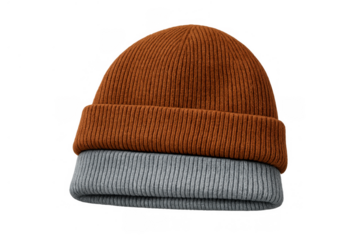 Two folded knit beanies in brown and grey colors, providing warm headwear for cold weather on a transparent background