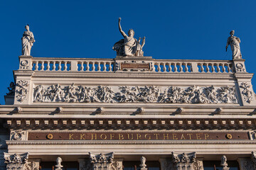 Architectural details of historic Vienna Burgtheater (Imperial Court Theatre) or &ldquo;K.K. Hofburgtheater&rdquo;, 1888. Sunset. VIENNA, AUSTRIA.