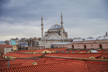 View of the rooftops of the Grand Bazaar with mosque in the background