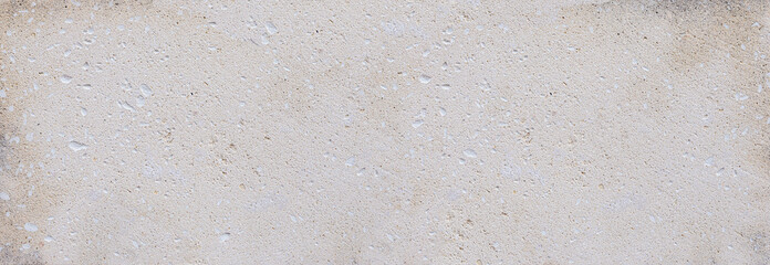 Rough limestone surface forming cement wall texture background