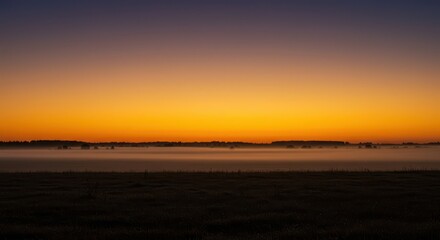 Capturing the ethereal beauty of a sunrise sequence. Rapid transition from dark night to vibrant golden morning light over the landscape ,golden ,transition ,energy