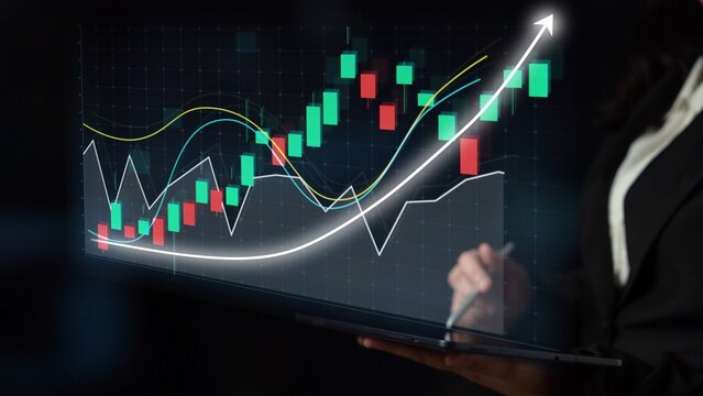 A business professional engages with high-tech financial data on a laptop screen, showcasing vibrant graphs and charts illustrating market trends and analysis. Copula - Powered by Adobe