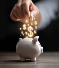 Hand Placing a Coin into a Piggy Bank with Rising Dollar Signs Symbolizing Savings and Financial Growth on a Dark Background symbolizing financial growth.