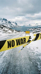 Yellow Barrier Tapes with "NO WAR" Text Blocking an Icy Snowy Road in Greenland Landscape