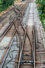 Fototapeta premium Detail of third rail electrified railway track showing points and crossover