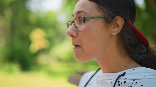 Young person observes distant woods, Young teenager pauses to stare at distant forested landscape, An youthful adolescent silently contemplates expansive view of faroff woodland scenery