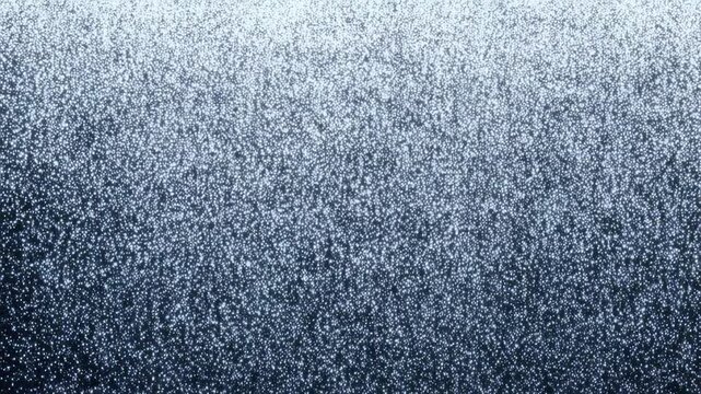 Snowfall progression against dark background creating winter atmosphere