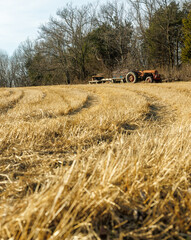 Fototapeta premium field and antique tractor