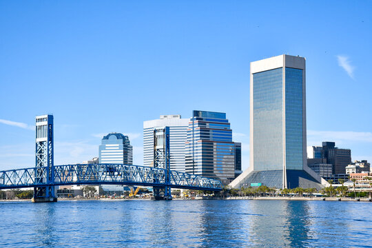 View of the Mainstreet Bridge over the St Johns River and downtown Jacksonville from the Southbank Riverwalk in Duval County, Florida. 