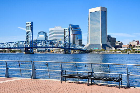 View of the Mainstreet Bridge over the St Johns River and downtown Jacksonville from the Southbank Riverwalk in Duval County, Florida. 