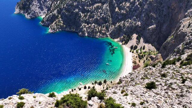 Aerial drone cinematic video of paradise beach of Agios Georgios in island of Symi, Dodecanese, Greece