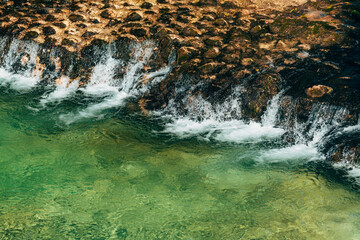 High angle view of Mostnica river cascading through rocks in Triglav National Park, Bohinj Valley, Slovenia.