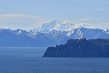 The nature of the Kamchatka Peninsula combines mountainous landscapes and forested areas, and is characterized by its unique topography, flora, and fauna, as well as its climate.