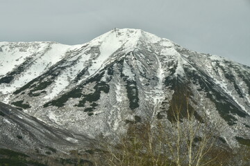The nature of the Kamchatka Peninsula combines mountainous landscapes and forested areas, and is characterized by its unique topography, flora, and fauna, as well as its climate.