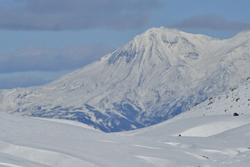 The nature of the Kamchatka Peninsula combines mountainous landscapes and forested areas, and is characterized by its unique topography, flora, and fauna, as well as its climate.