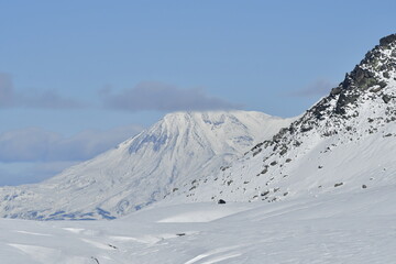 The nature of the Kamchatka Peninsula combines mountainous landscapes and forested areas, and is characterized by its unique topography, flora, and fauna, as well as its climate.