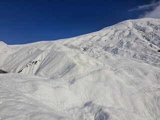 The nature of the Kamchatka Peninsula combines mountainous landscapes and forested areas, and is characterized by its unique topography, flora, and fauna, as well as its climate.