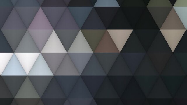 A sophisticated VJ loop featuring a matte mosaic of cool slate, charcoal, and muted taupe triangles. This clean, geometric pattern provides a modern and understated backdrop for live sets.