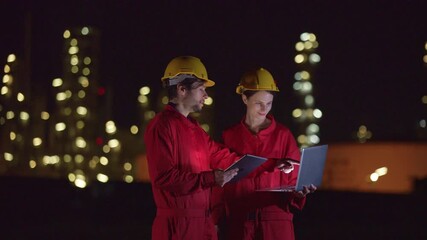 Engineers’ night shift working oil and gas refinery service, Workers hard work at night petroleum industry plant background, Oil and Gas Petrochemical industry.