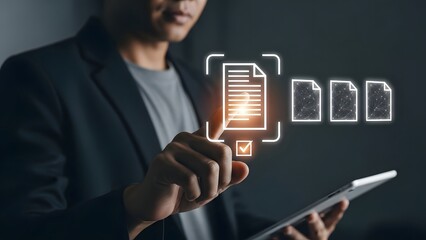 Man using a tablet is pointing at a digital projection of a document scanning and checking process.