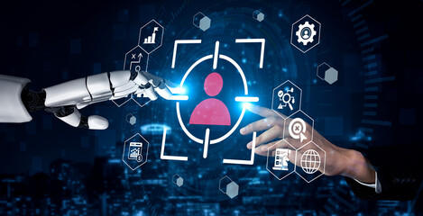 This image depicts a captivating interaction between a robotic arm and a human hand, symbolizing the merging of technology and human experience in a digital landscape. Gantry