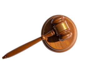 Judge gavel casting a long shadow, law authority concept, white background.