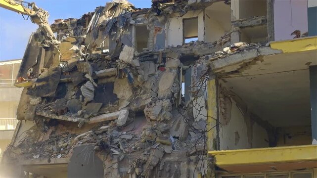 Building House Demolition and Construction Site Excavator Digger with Hydraulic Crasher Machine Footage.