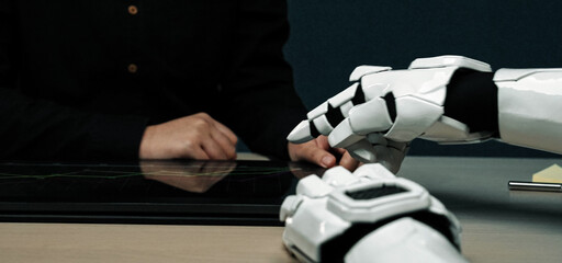 In a sleek office setting, a consultant and colleagues rely on AI to interpret research outcomes, refine marketing decisions, and elevate their project roadmap. Noogenesis AI