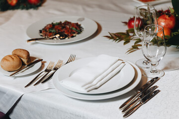 Elegant Table Setting with Cutlery and Glasses
