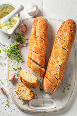 Fresh and delicious garlic bread with herbs and salt.