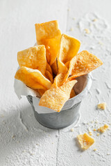 Tasty and homemade angel wings with powdered sugar.