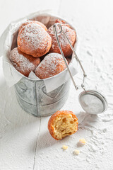 Hot and tasty mini doughnuts baked at home.
