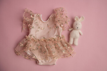 Newborn clothes with toys and flowers in a beautifully folded position for a photo © VideofotKA