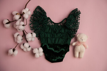 Newborn clothes with toys and flowers in a beautifully folded position for a photo © VideofotKA