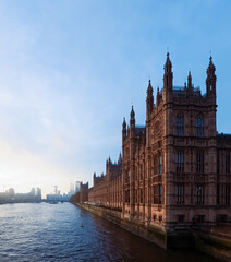 Fototapeta premium Palace of Westminster and River Thames cityscape in London, United Kingdom at sunrise with historic architecture