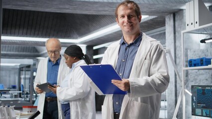 Bio science expert focuses on experiment data in a research study. Laboratory equipment and...