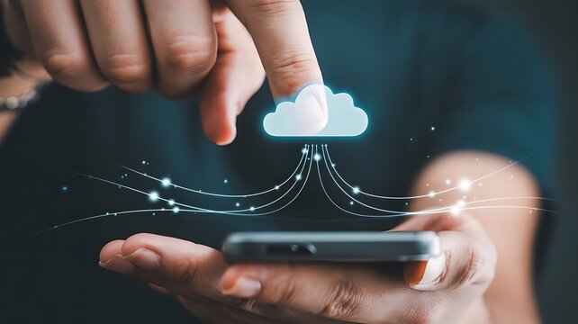 Finger touching glowing cloud icon connected to smartphone with light streams technology - Powered by Adobe