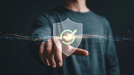 Person Interacting with a Transparent Shield Icon Featuring a Green Checkmark and Data Streams