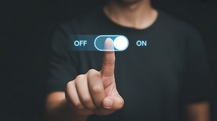 Person's Finger Tapping an Illuminated ONOF Toggle Switch Interface image photo