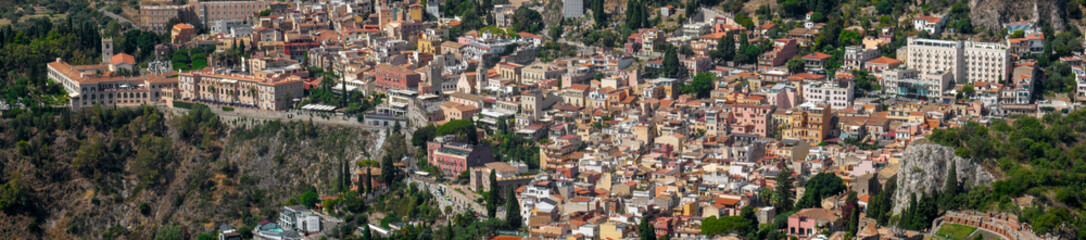 Aerial panoramic view of the historic center of Taormina, a town in the province of Messina,...