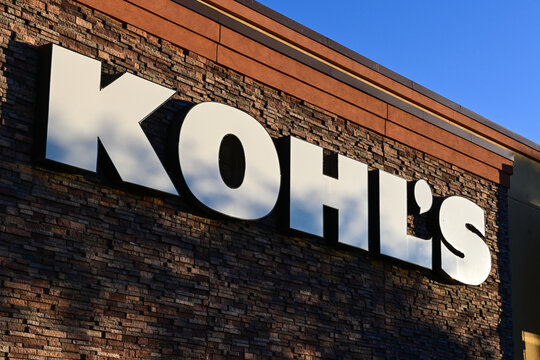Close view of Kohls retail store signage on a commercial building facade, representing department store branding, consumer shopping, and retail operations