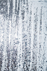 Silver sequin texture background with sparkling reflective surface