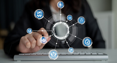 A business professional interacts with a digital interface on a keyboard, symbolizing technology and communication in a modern workspace, showcasing innovation. Crux